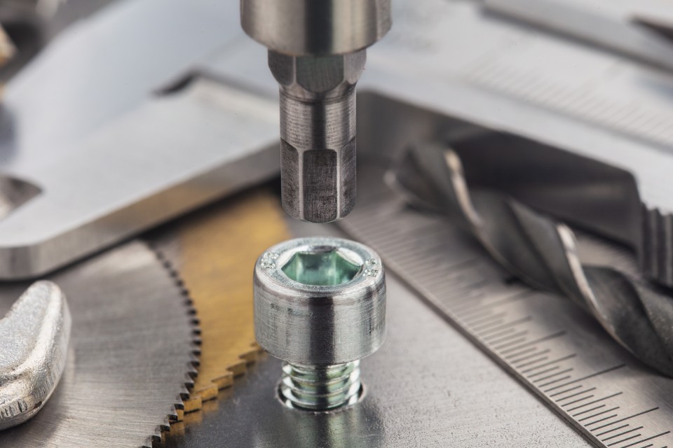 Screw and driver